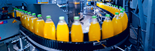 Juice bottles on a conveyor belt