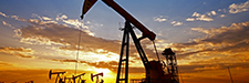 Oil pump silhouette at sunrise